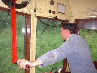 Driver at the controls of an autotrain