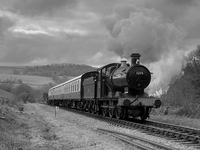 3205 with passenger train B&W